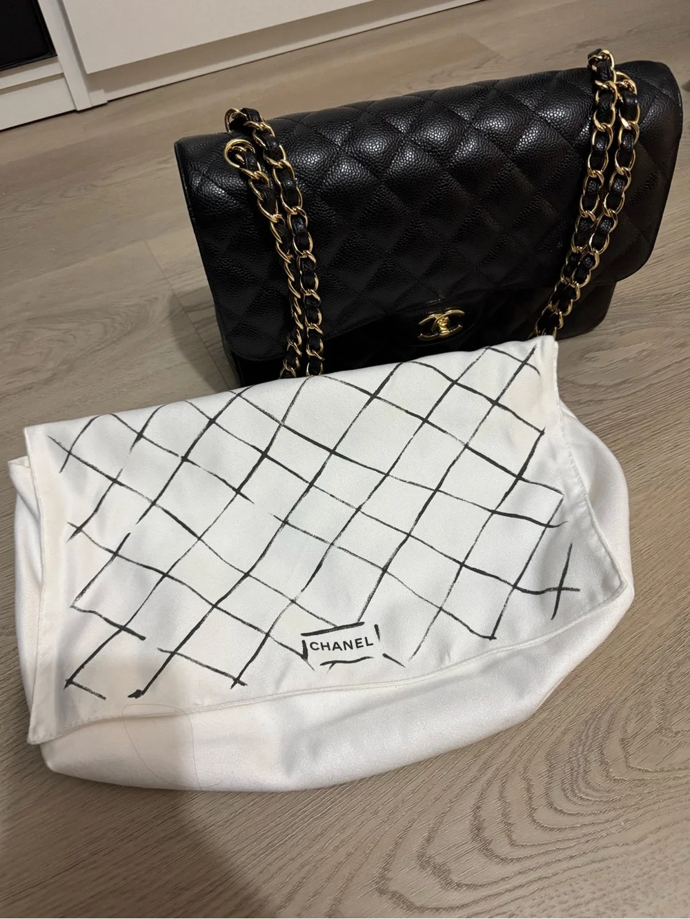 CHANEL Black Quilted Caviar Leather Shoulder Bag with Gold Hardware